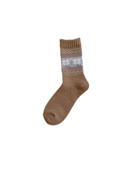 Brown crew sock with pale blue snowflake band