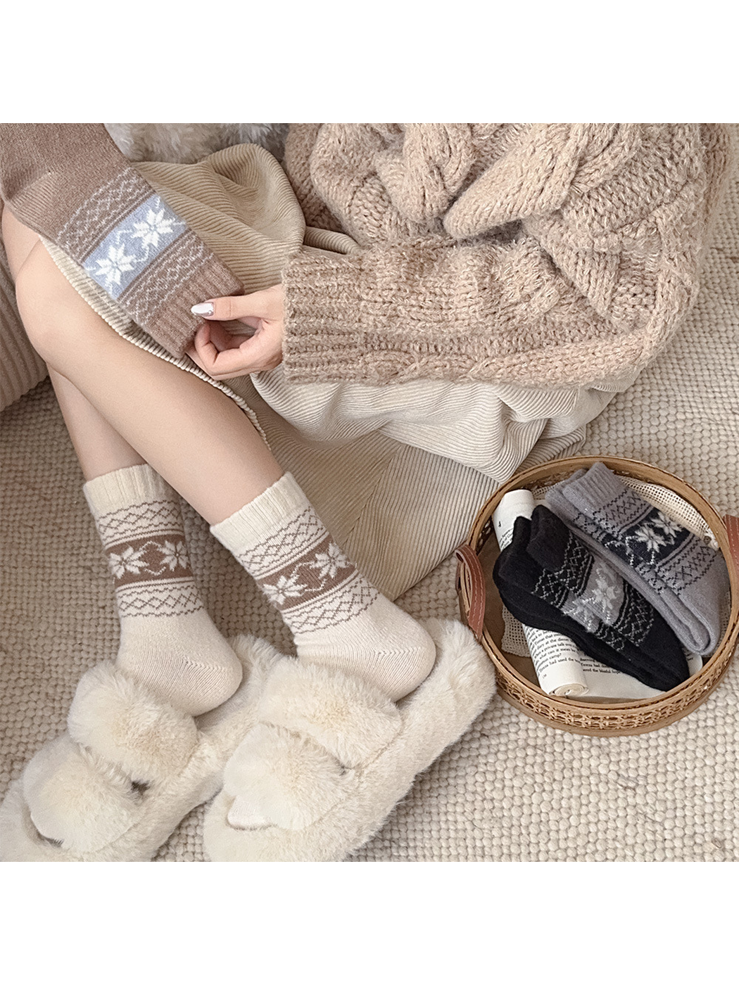 Ivory snowflake socks worn beside folded color options