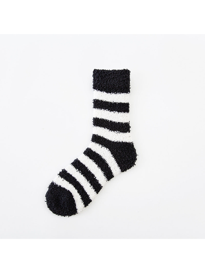 Black and white striped fuzzy crew sock