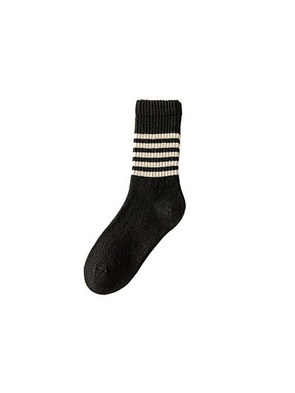 Black crew sock with cream stripes and a ribbed cuff