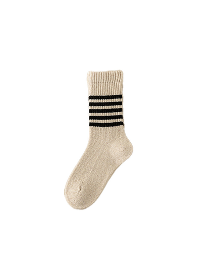 Beige crew sock with black stripes and a ribbed cuff