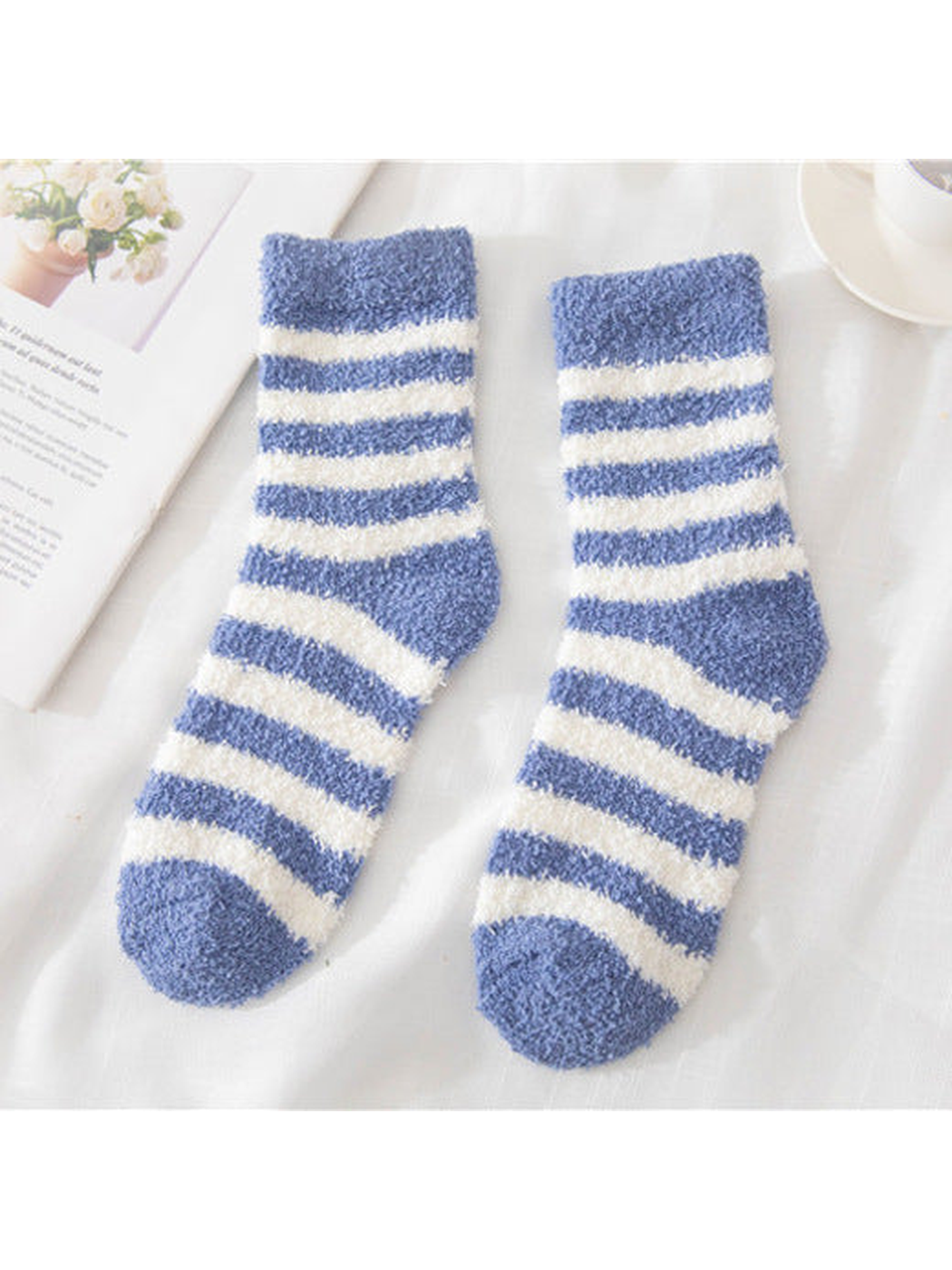 Blue fuzzy socks with cream stripes