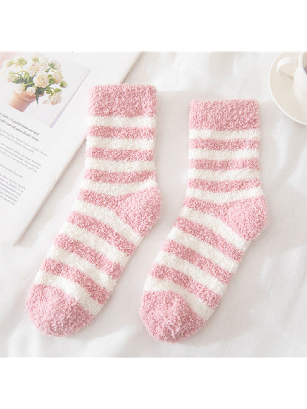 Light pink fuzzy socks with cream stripes