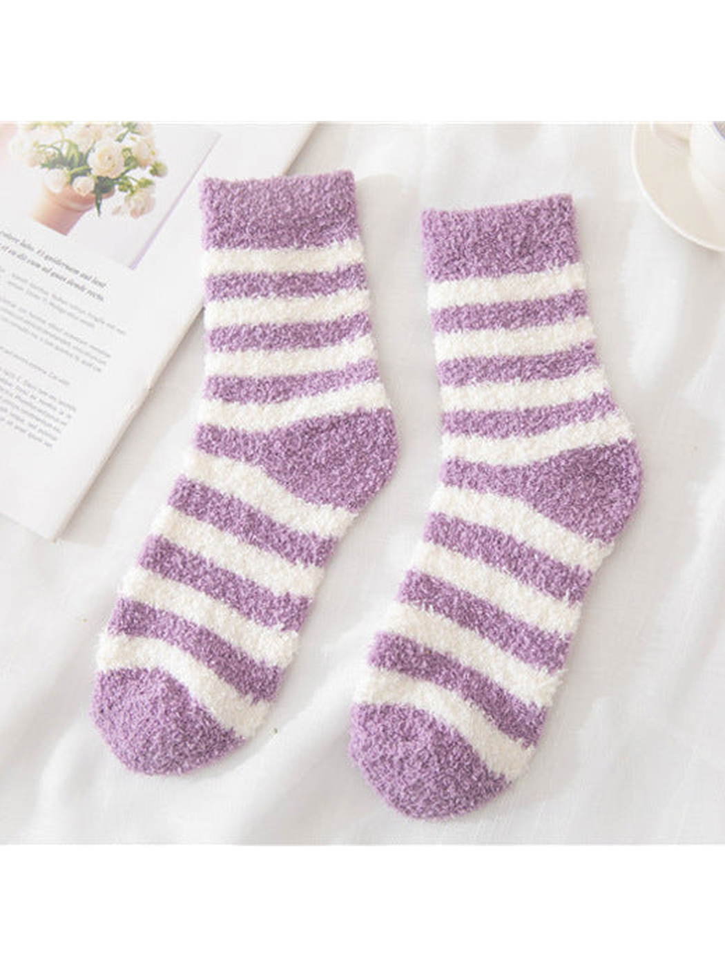 Light purple fuzzy socks with cream stripes