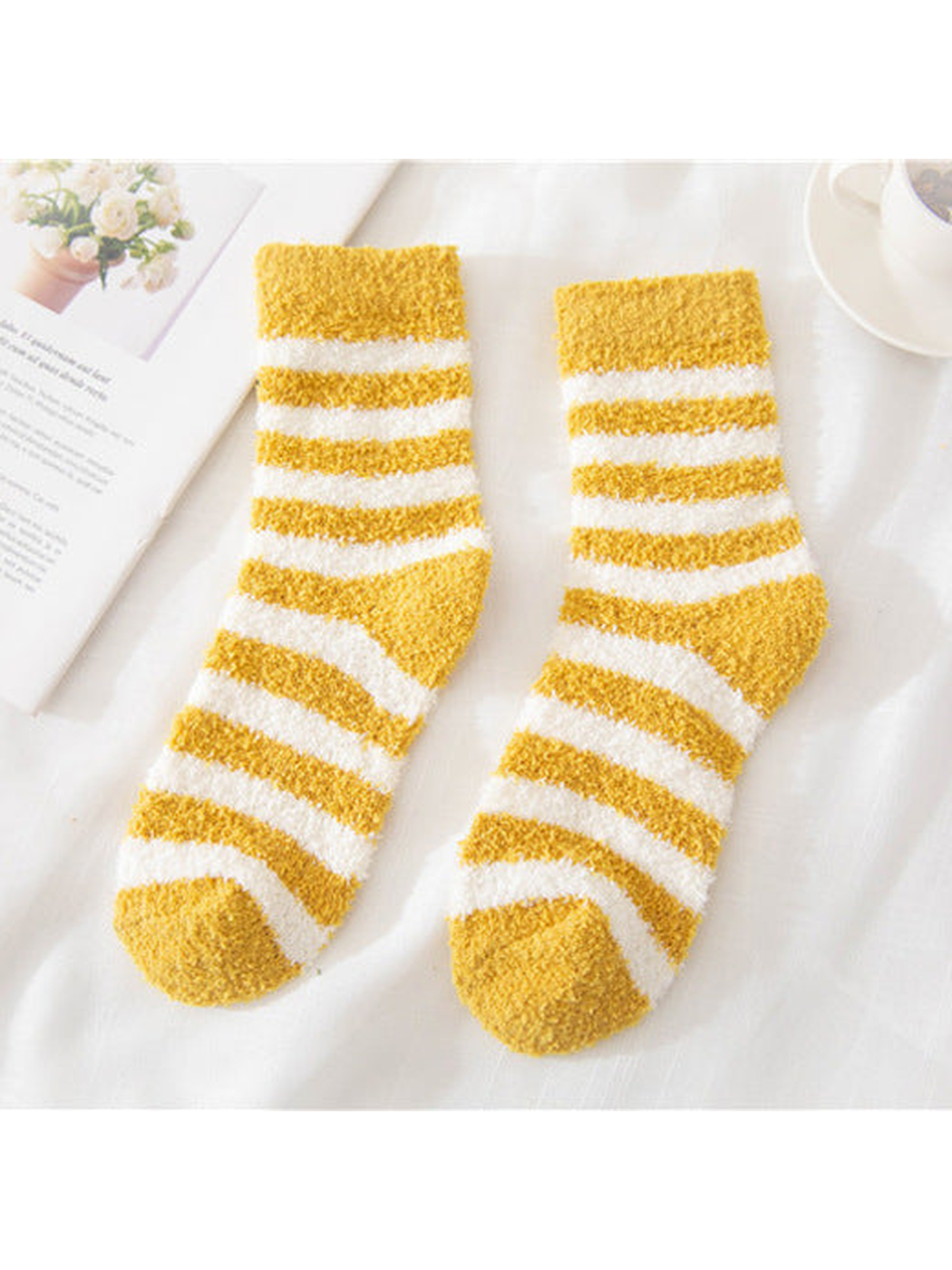 Mustard yellow fuzzy socks with cream stripes