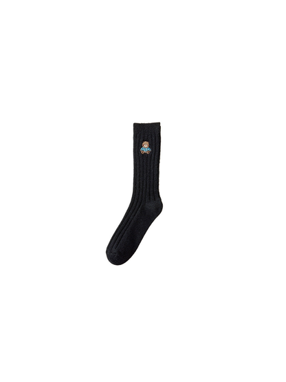 Black ribbed crew sock with an embroidered bear in a blue sweater
