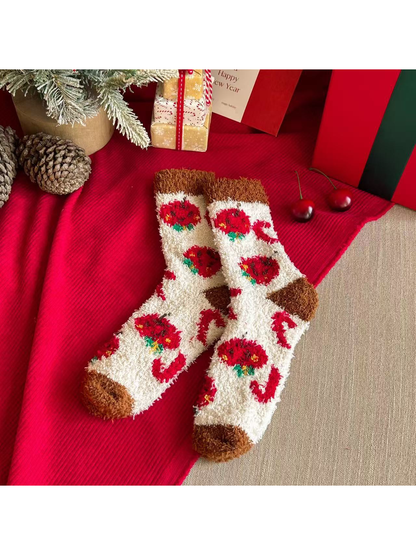 Ivory fuzzy crew socks with red apple motifs and brown cuffs and toes