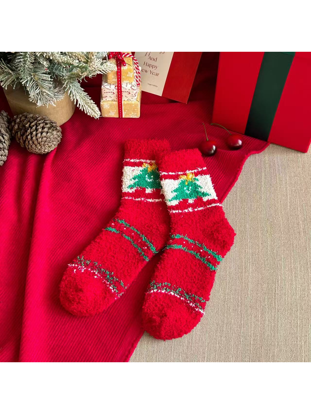 Red fuzzy crew socks with framed green Christmas tree motifs