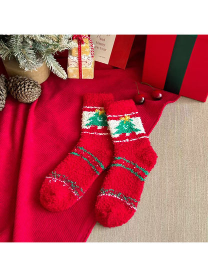 Red fuzzy crew socks with framed green Christmas tree motifs