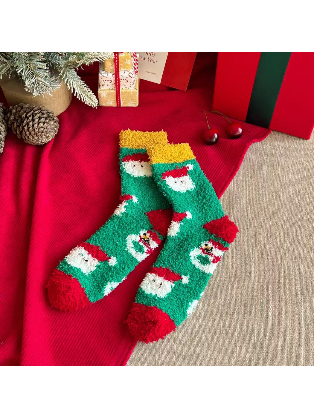 Green fuzzy crew socks with Santa and snowman motifs and red toes