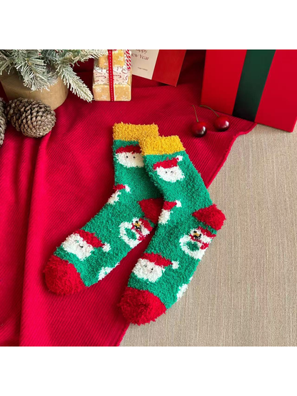 Green fuzzy crew socks with Santa and snowman motifs and red toes