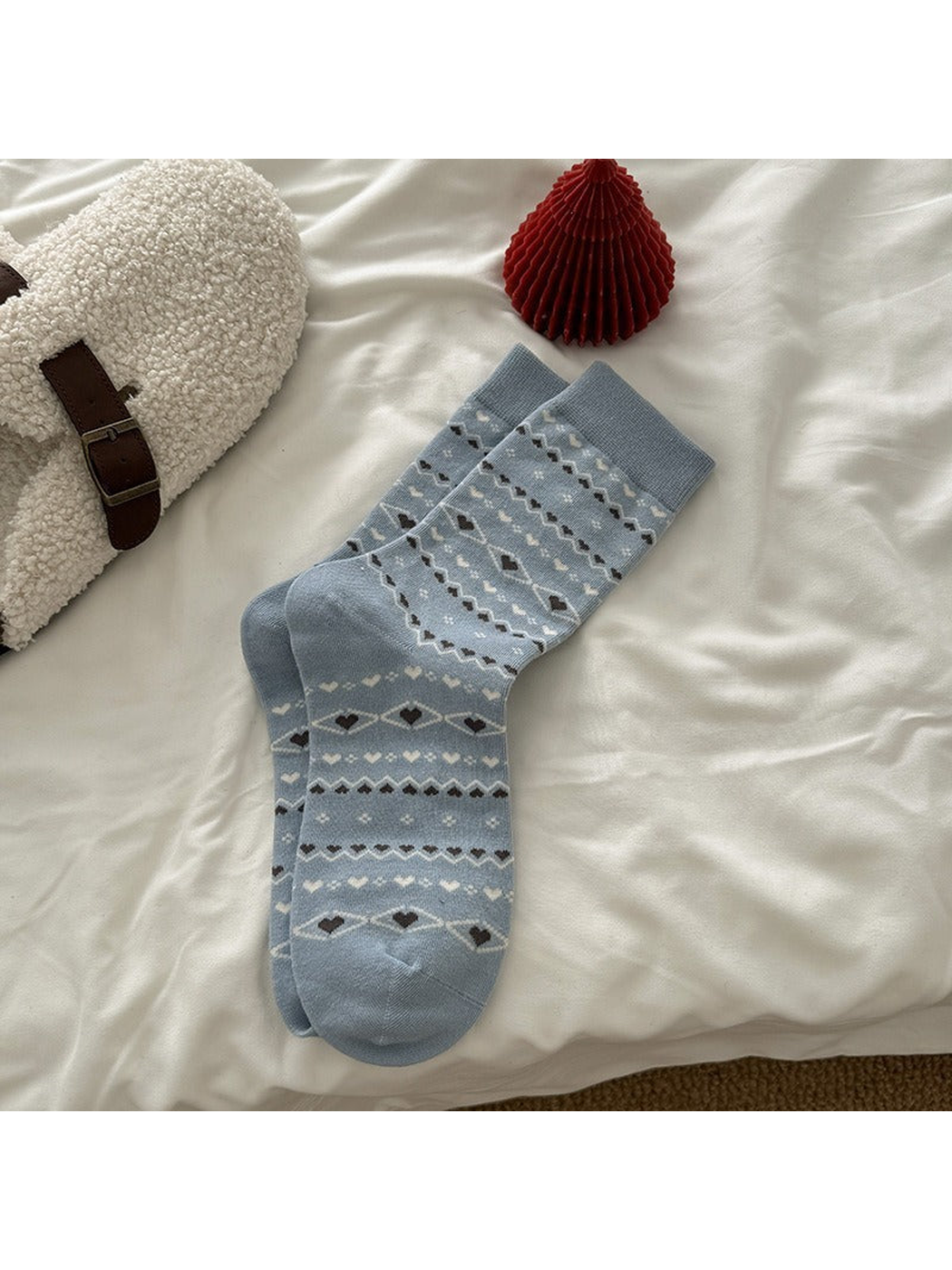 Light blue crew socks with heart and geometric motifs