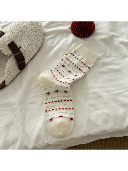 Ivory crew socks with red hearts and geometric motifs