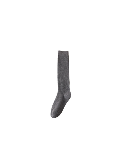 Dark gray knee-high sock on a white background