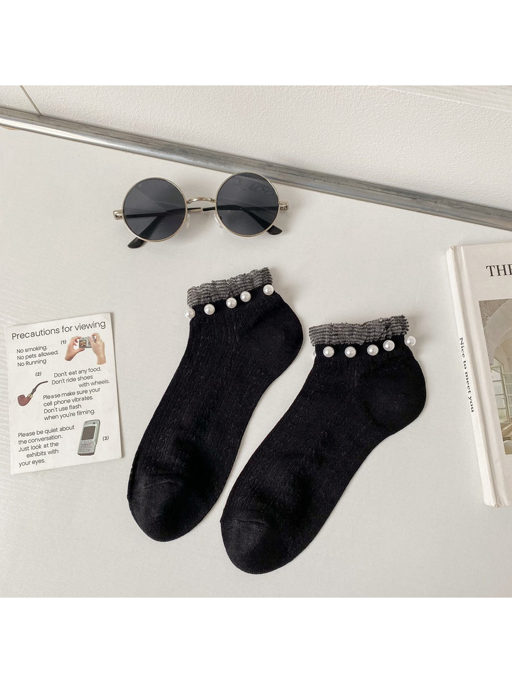 Black ankle socks with contrasting cuffs and pearl-like bead trim