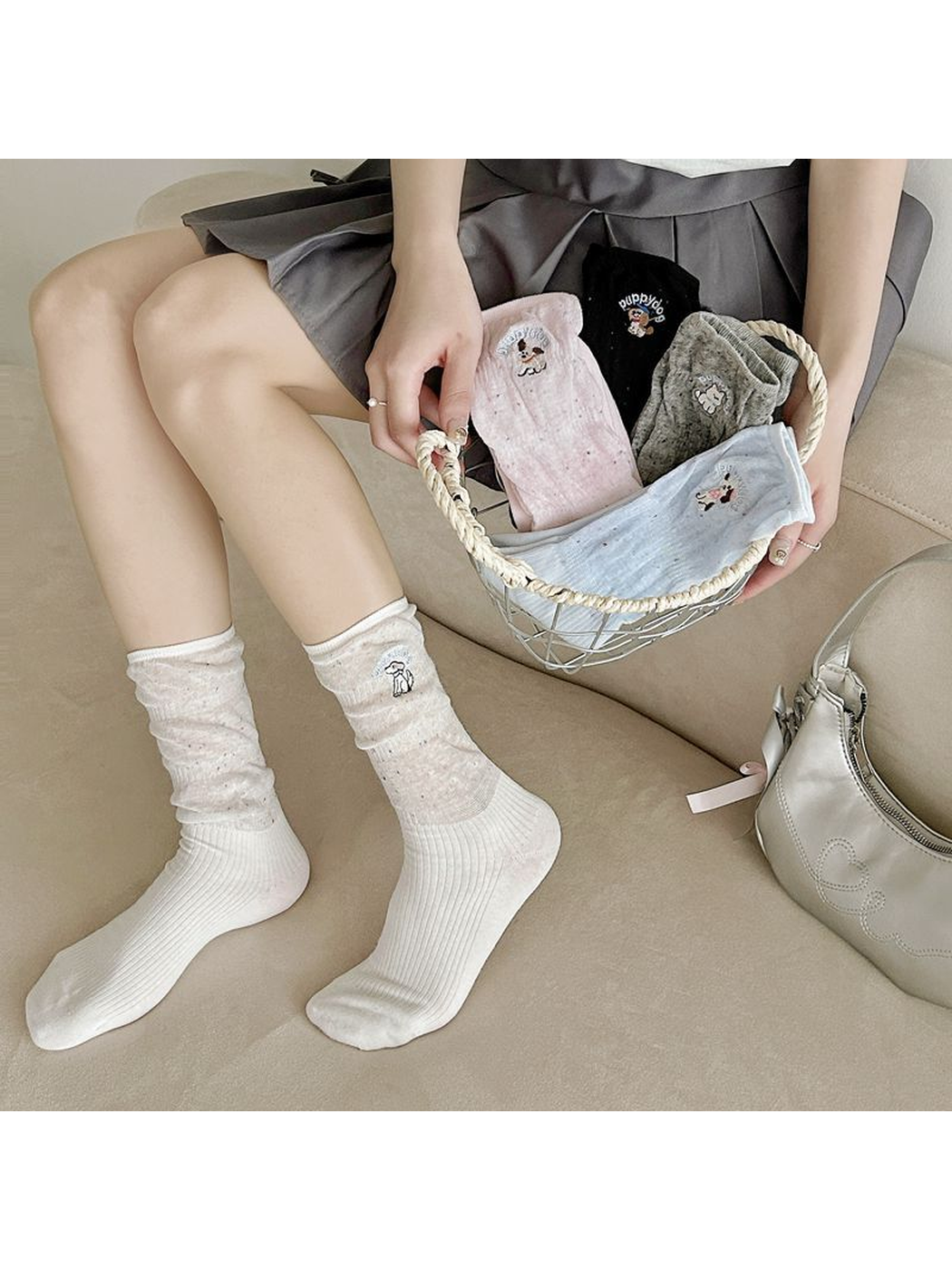 White crew socks worn beside a basket displaying multiple color options