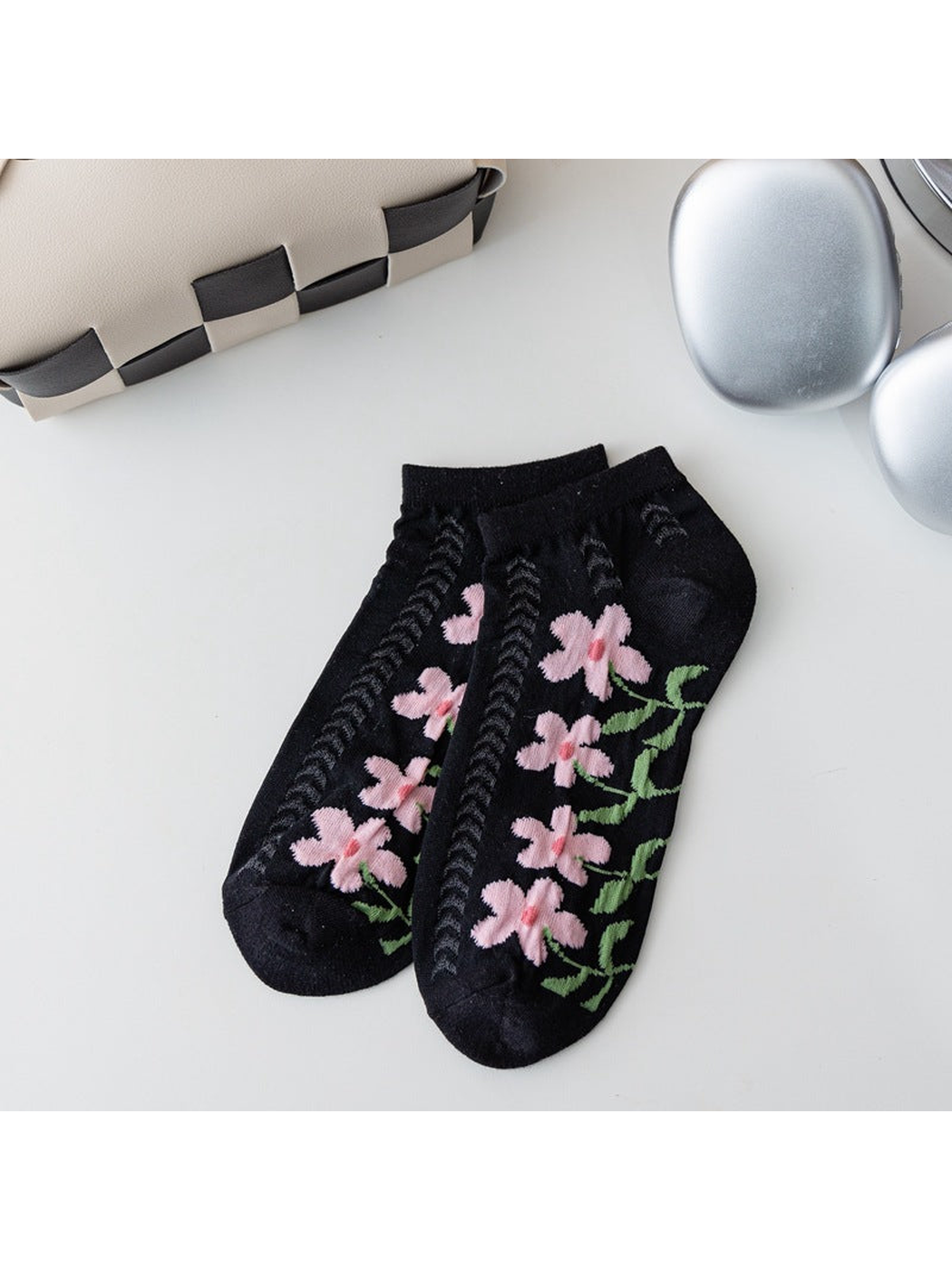 Black ankle socks with pink flowers and openwork knit panels
