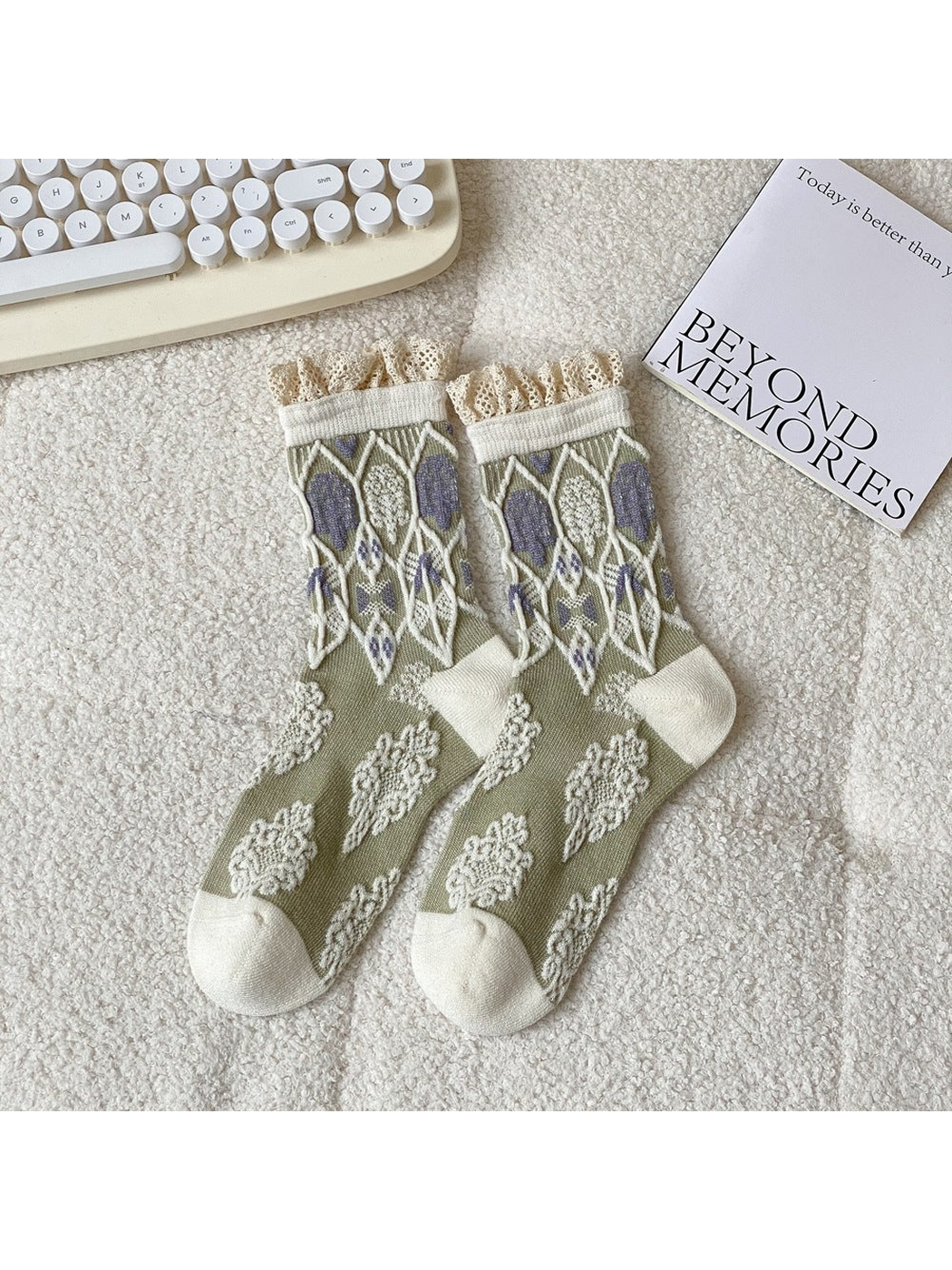 Beige crew socks with geometric motifs and lace-trimmed cuffs
