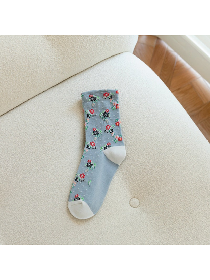 Light blue floral crew sock with pale contrasting toe and heel