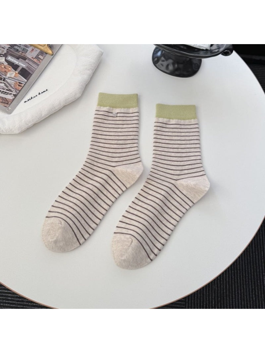 Beige striped crew socks with contrasting olive green cuffs