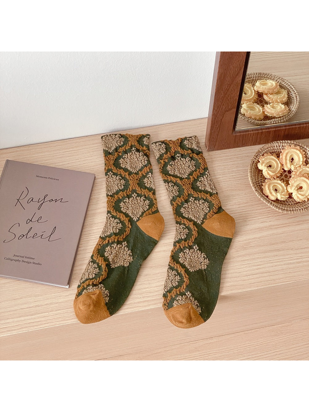 Army green patterned crew socks with ochre toes and heels