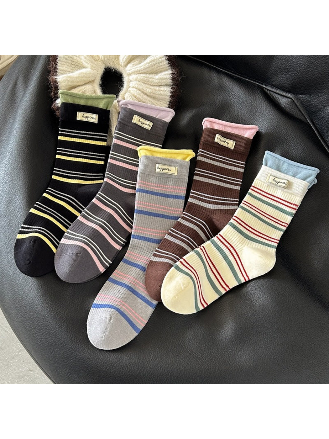 Five striped crew sock styles arranged together
