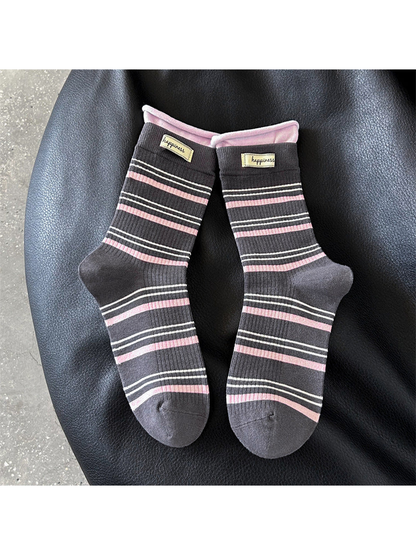 Dark gray crew socks with pink and white stripes