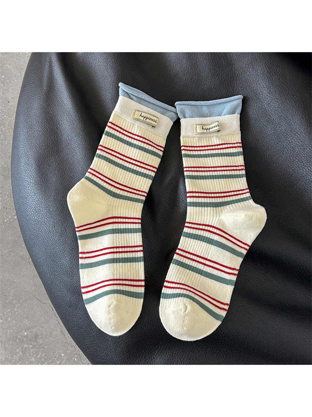 Ivory crew socks with red and green stripes and blue cuffs