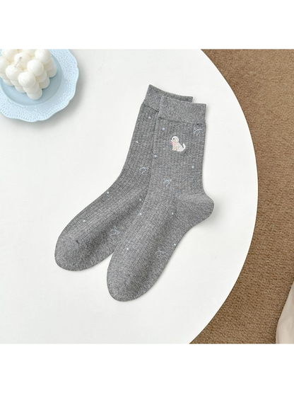 Dark gray crew socks with embroidered animal, bow and dot motifs