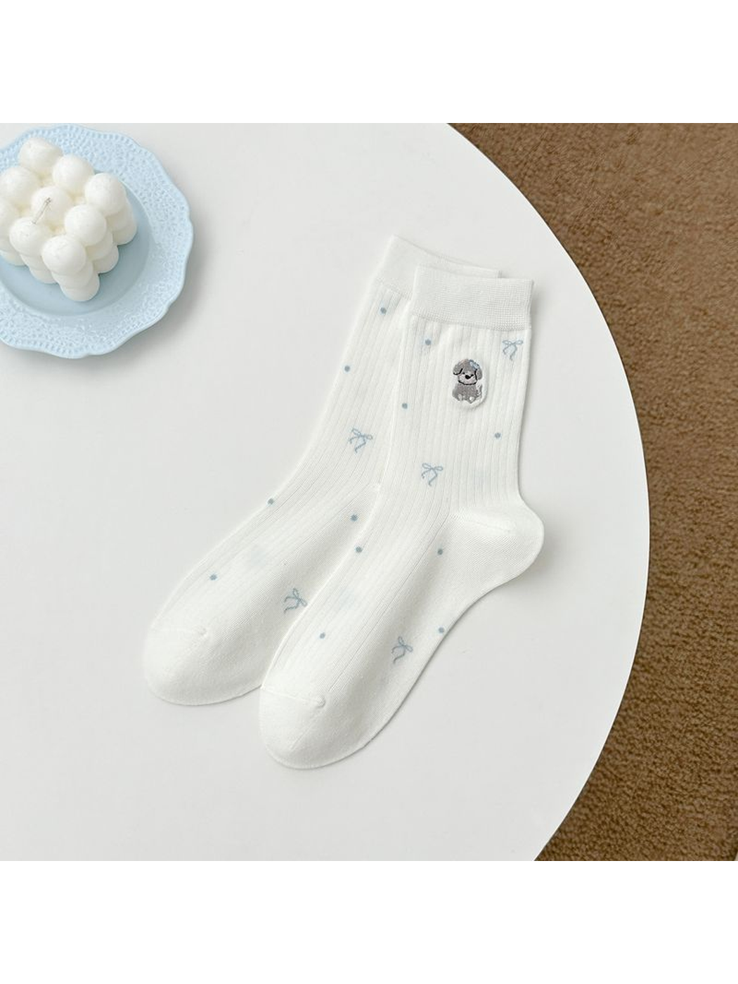 White crew socks with embroidered animal, bow and dot motifs