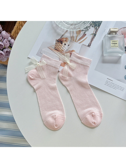 Light pink ankle socks with ivory lace bows