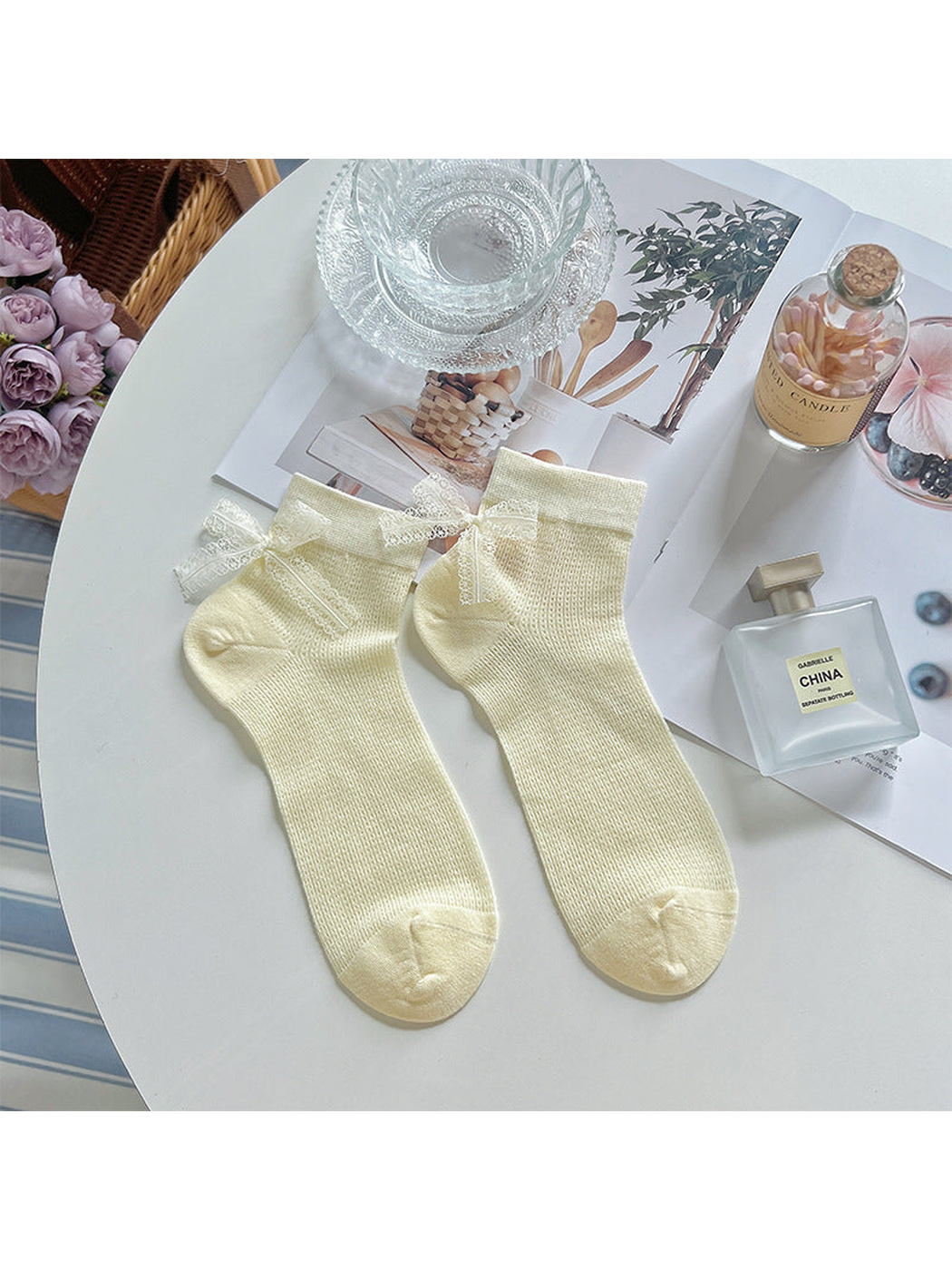 Pale yellow ankle socks with ivory lace bows