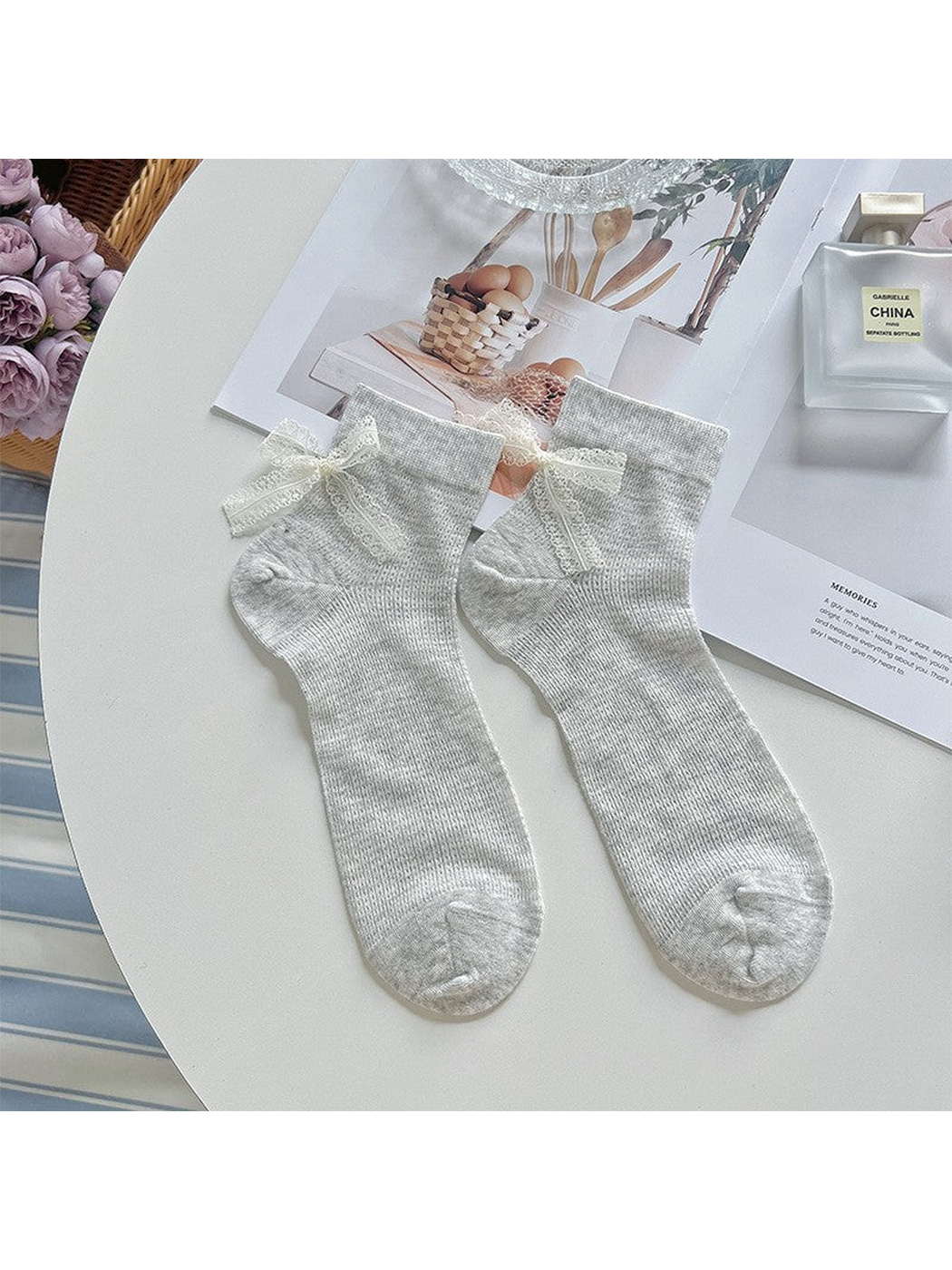 Light gray ankle socks with ivory lace bows