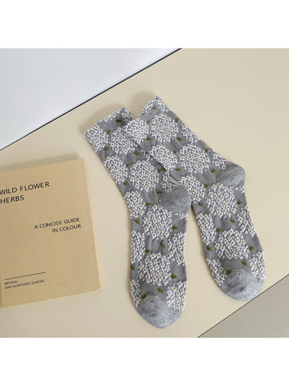 Light gray crew socks with raised white floral clusters