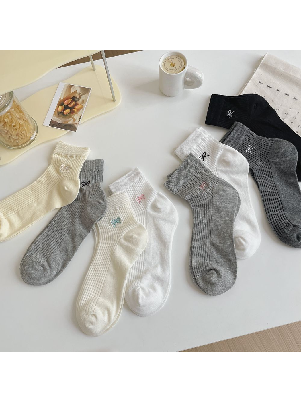 Embroidered bow ankle socks in white, ivory, yellow, gray and black