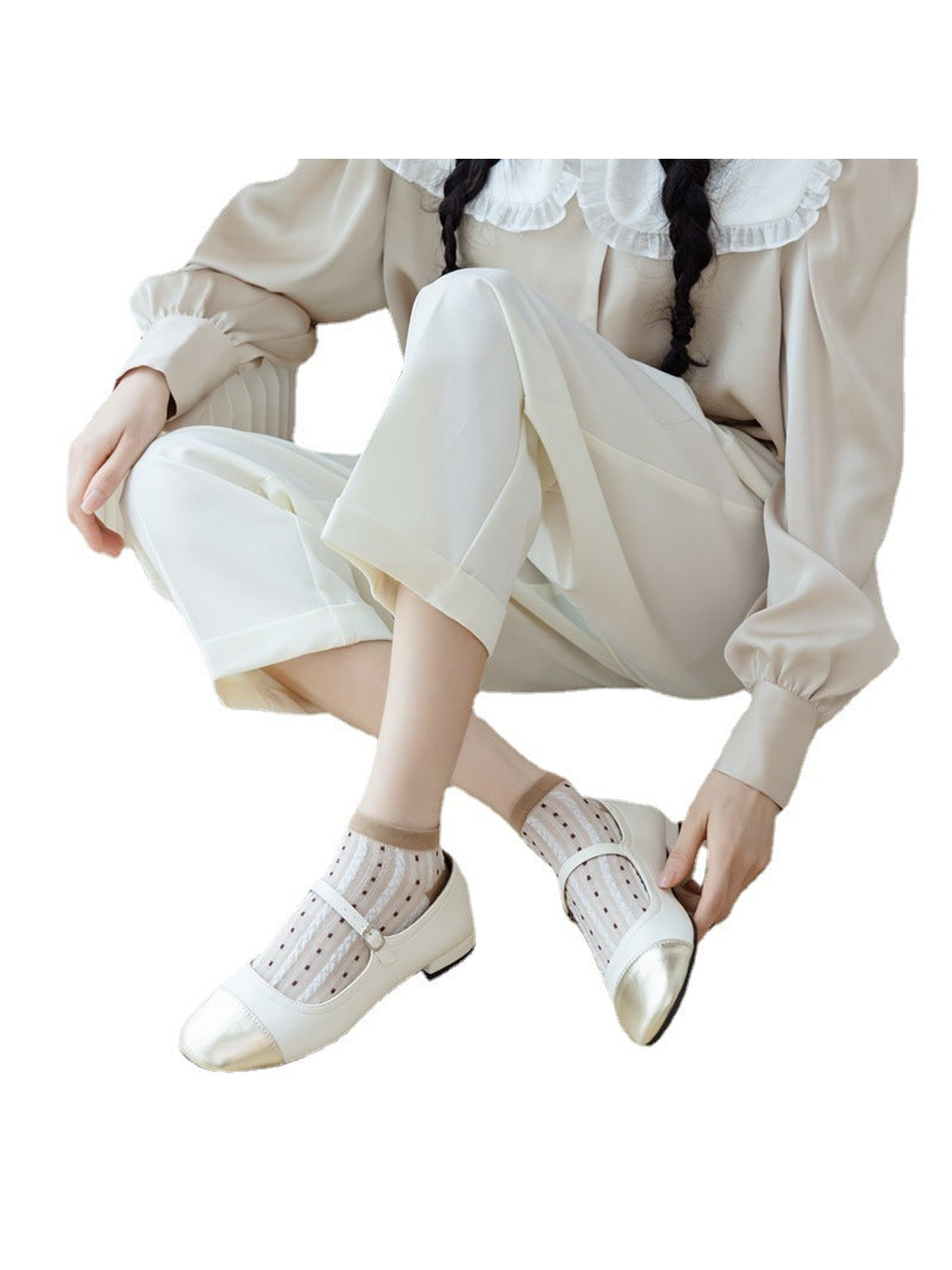 Khaki dotted ankle socks styled with white strap shoes
