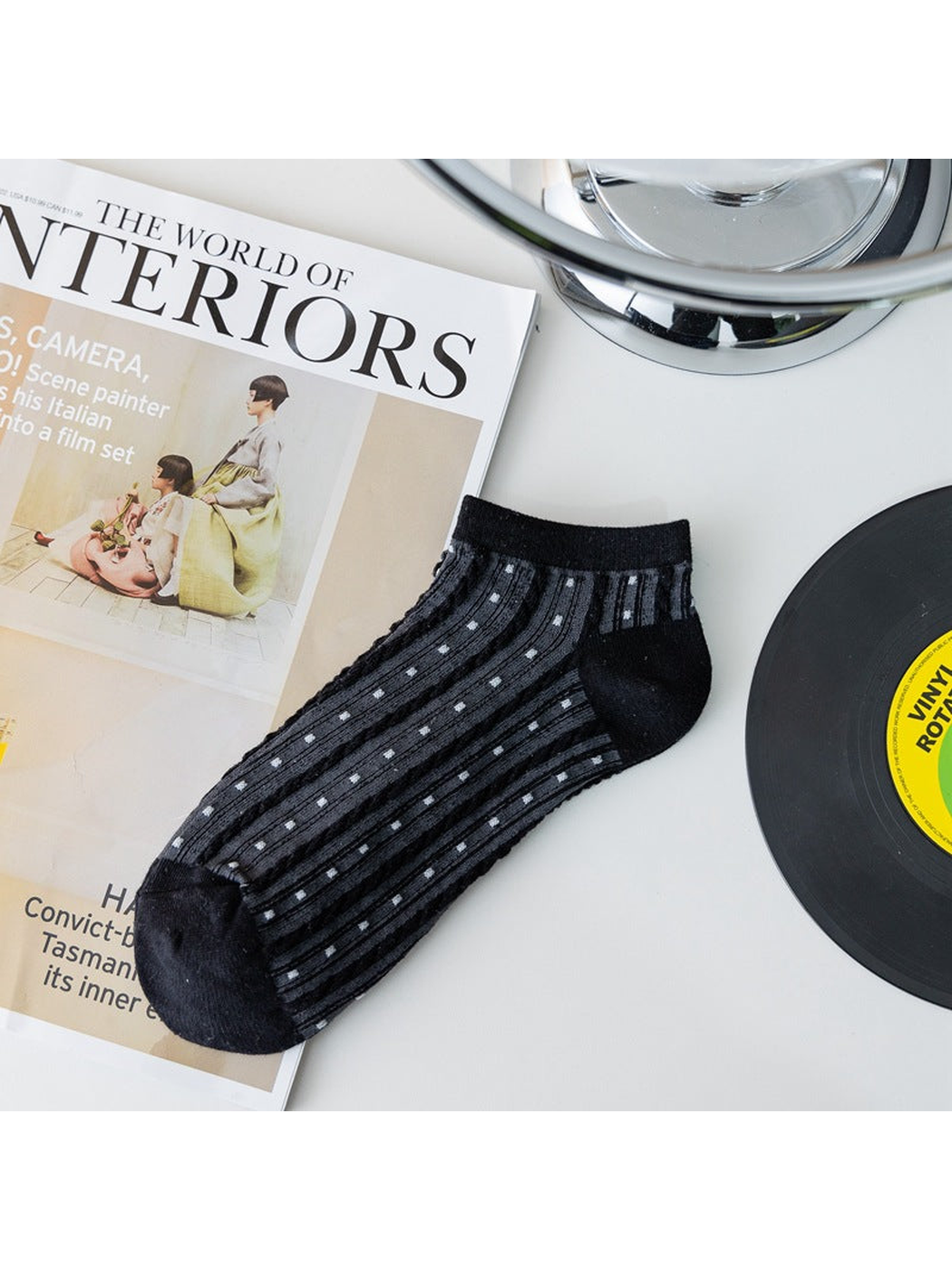 Black sheer ankle sock with dotted vertical stripes