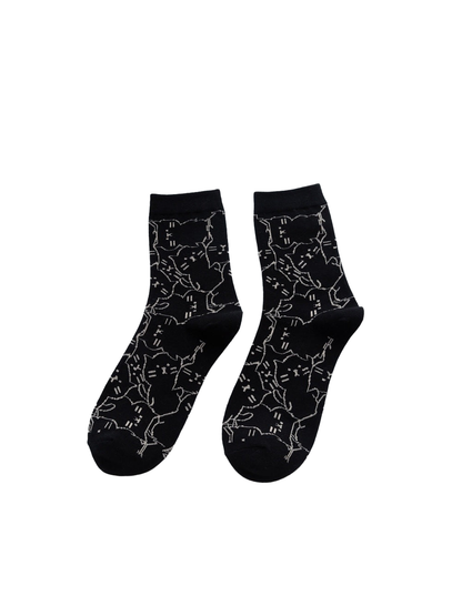 Black crew socks with an allover cat outline pattern