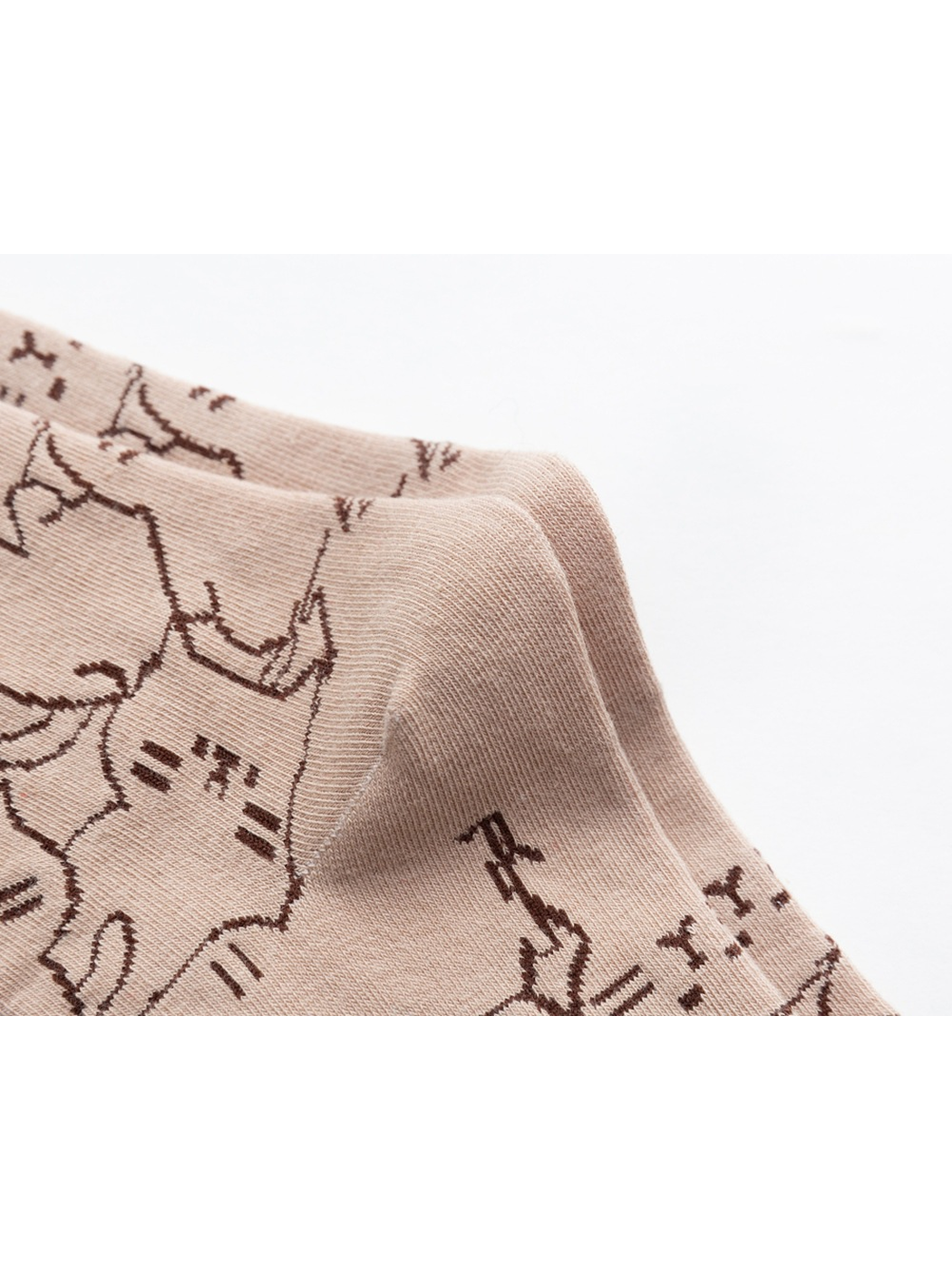 Close-up of the shaped heel and continuing cat outline pattern