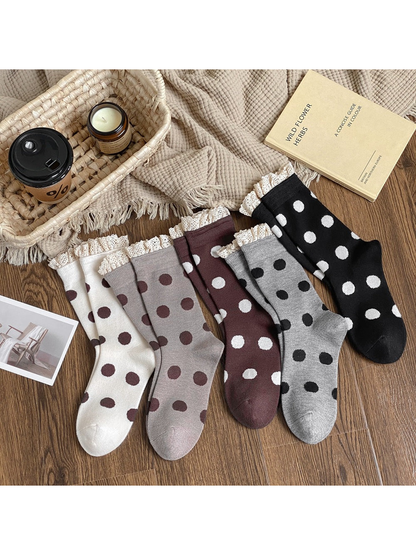 Five colors of lace-trimmed polka dot crew socks displayed together