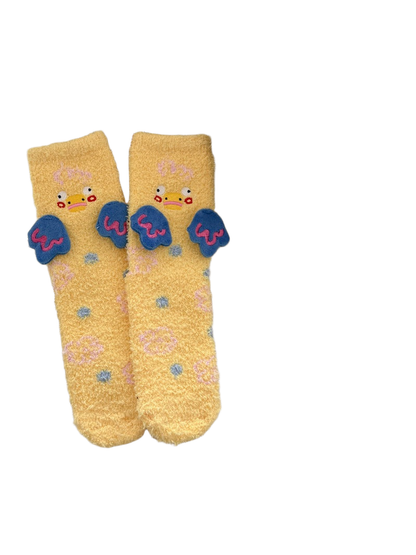 Bright yellow duck-motif fuzzy crew socks with raised blue wing appliqués