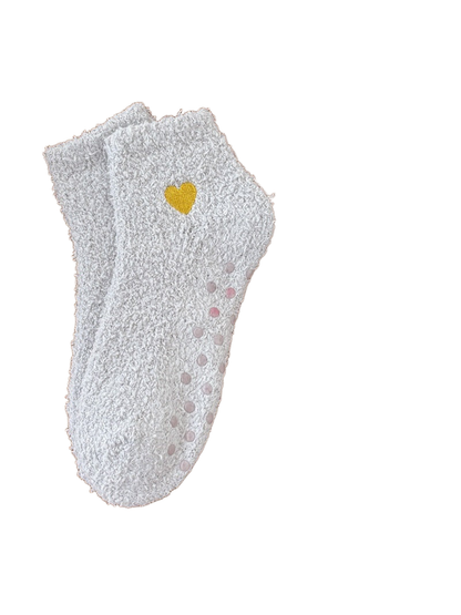 Light gray fuzzy ankle socks with yellow heart embroidery