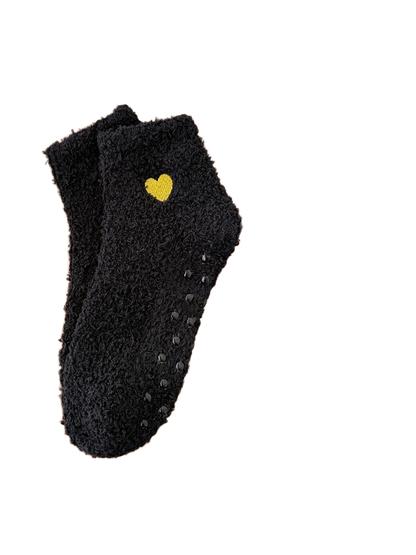 Black fuzzy ankle socks with yellow heart embroidery
