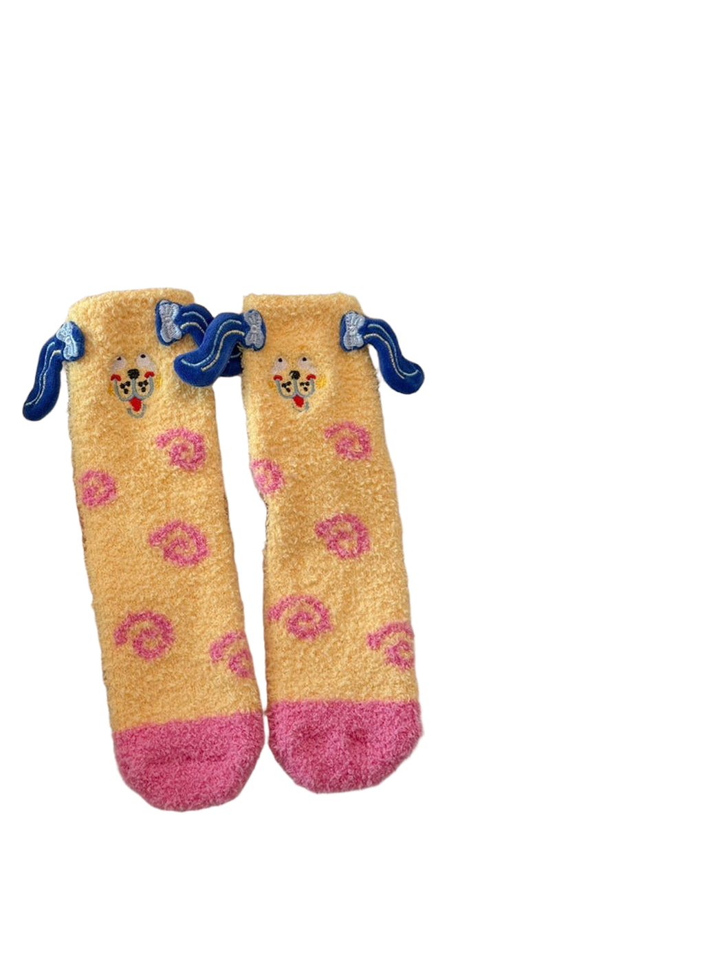 Pale yellow fuzzy crew socks with pink toes and dark blue ear appliqués