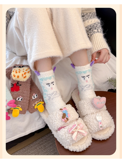 White character crew socks with purple appliqués worn with slippers