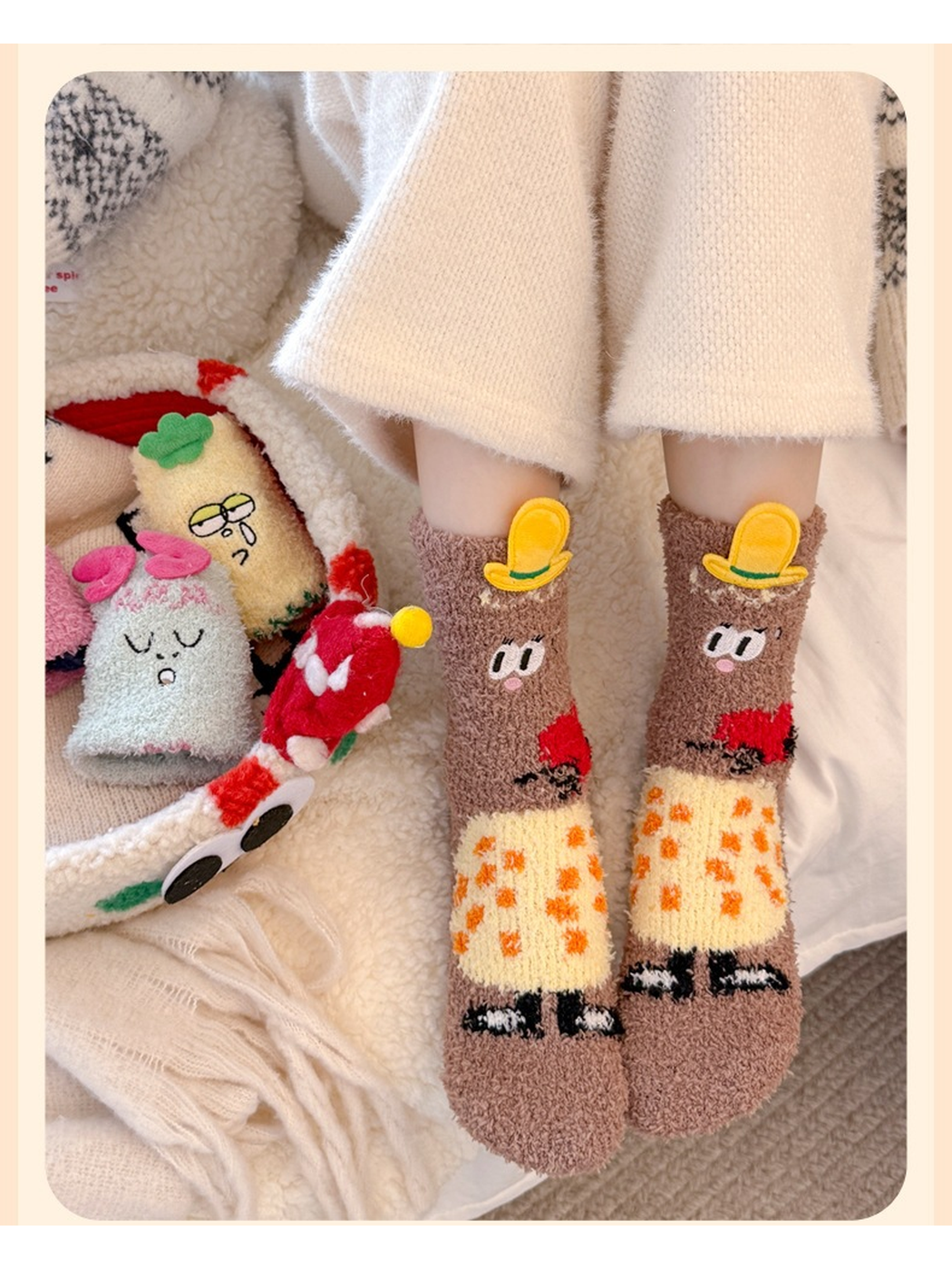 Brown character crew socks with yellow hat appliqués worn indoors