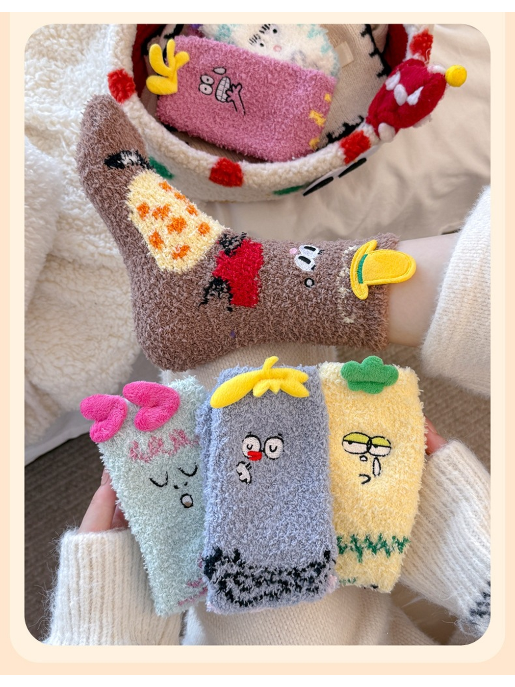 Brown character sock worn above folded mint, gray and yellow designs