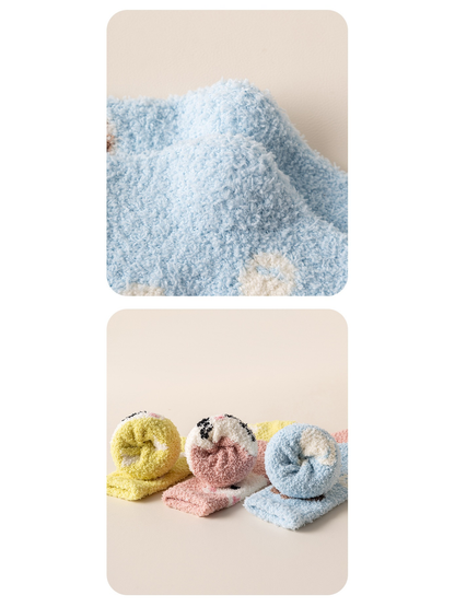 Close-up of the light blue socks' fuzzy surface and rolled openings