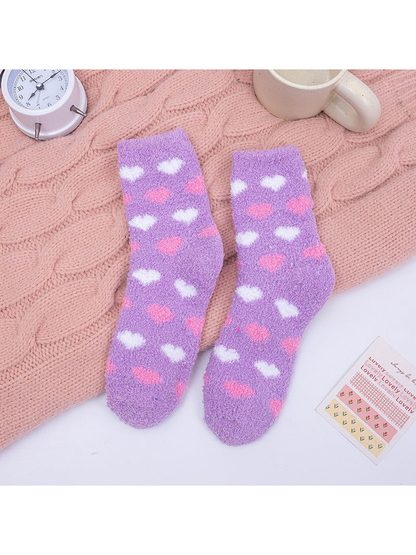 Light purple fuzzy crew socks with pink and white heart motifs