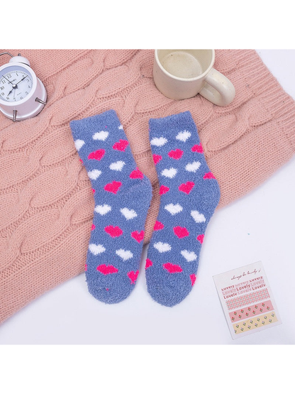 Gray-blue fuzzy crew socks with pink and white heart motifs